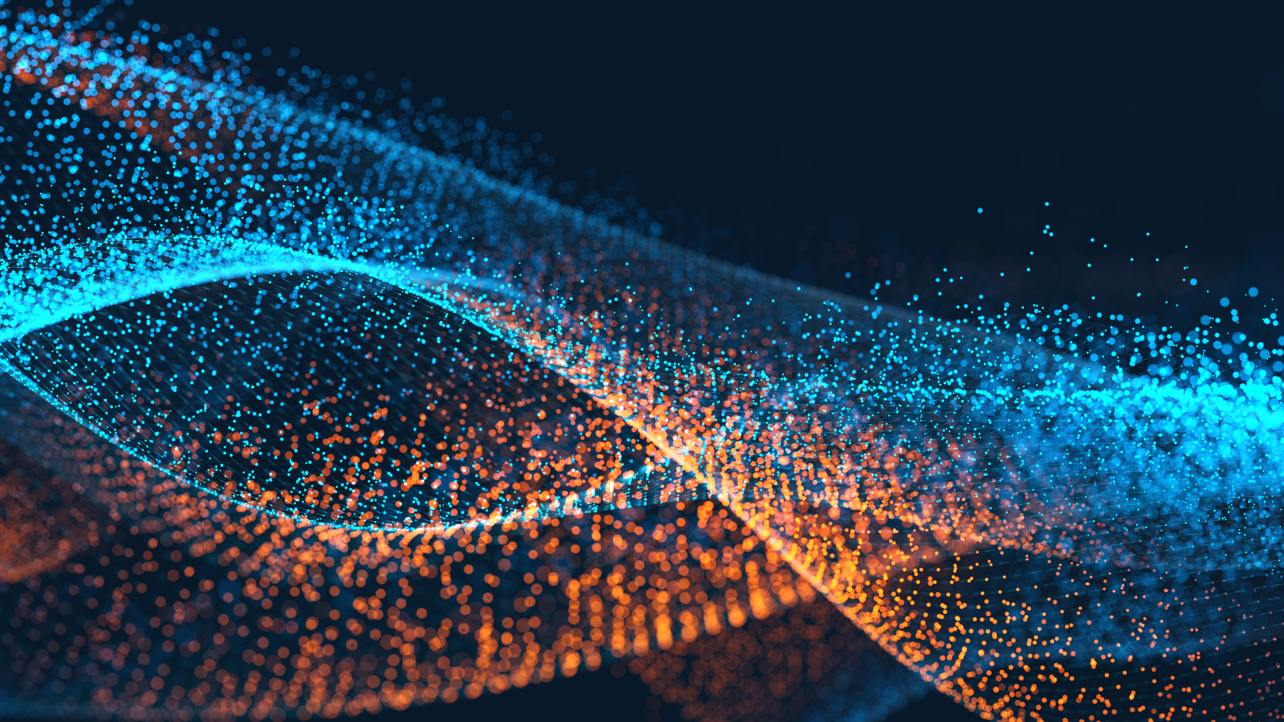 Blaue und orangefarbene digitale Linien, bestehend aus Partikeln