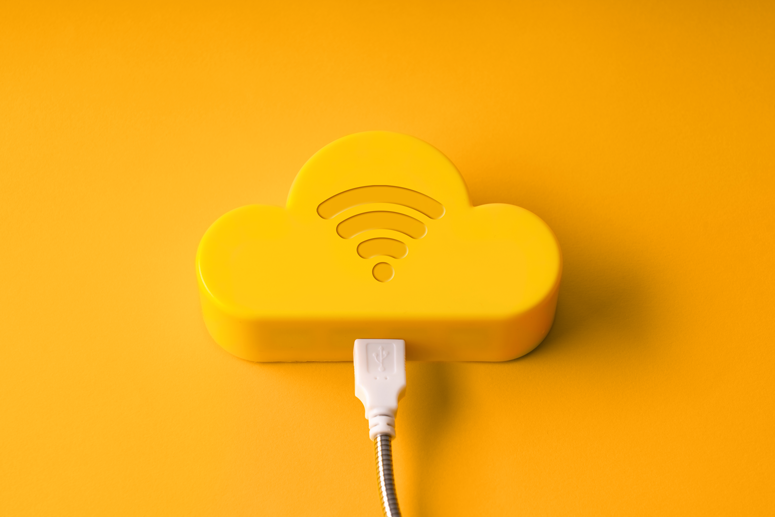 Moderne Cloud und Rechenzentren Gelbe Wolke mit W-LAN Symbol