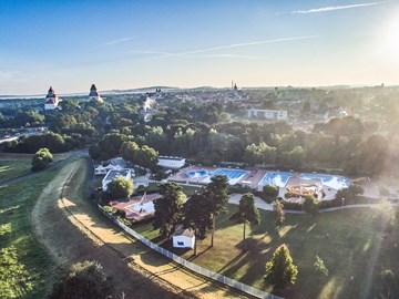 Headerbild Aufnahme von oben über eine Stadt